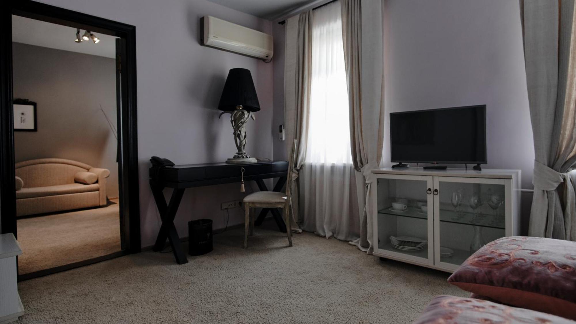 Vozdvyzhensky Boutique Hotel Kyiv Quarto foto